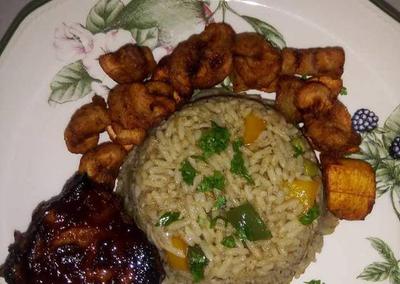 Seafood Basmati Rice Paired With Plantain And Peppered Turkey